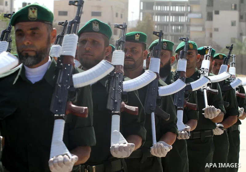 Palestinian Hamas National security force officers stand to attention during their graduation ceremony in Gaza City on April 19, 2012. Photo by Mohammed Asad