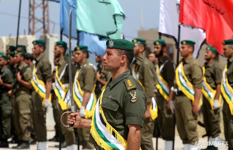 Palestinian Hamas National security force officers stand to attention during their graduation ceremony in Gaza City on April 19, 2012. Photo by Mohammed Asad