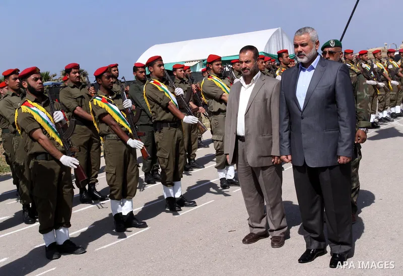 Palestinian Prime Minister in Gaza Strip, Ismail Haniya, attends a graduation ceremony of National security force officers in Gaza City on April 19, 2012. Photo by Mohammed Asad