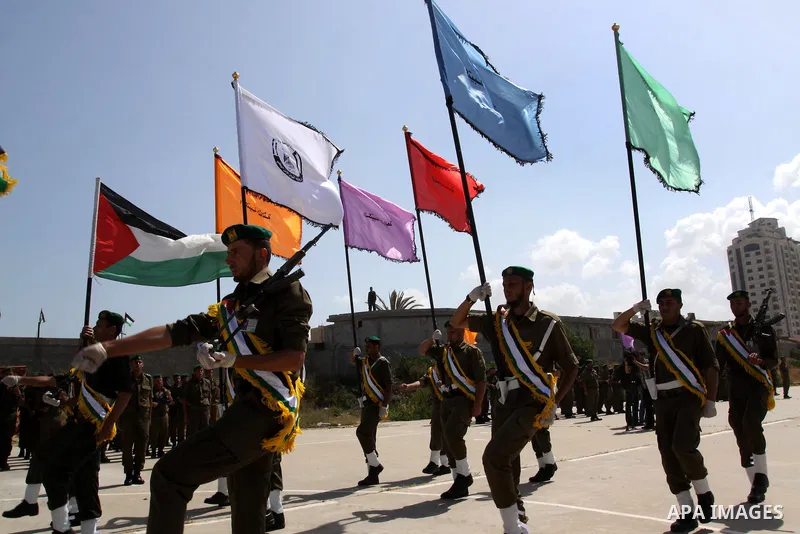 Palestinian Hamas National security force officers stand to attention during their graduation ceremony in Gaza City on April 19, 2012. Photo by Mohammed Asad