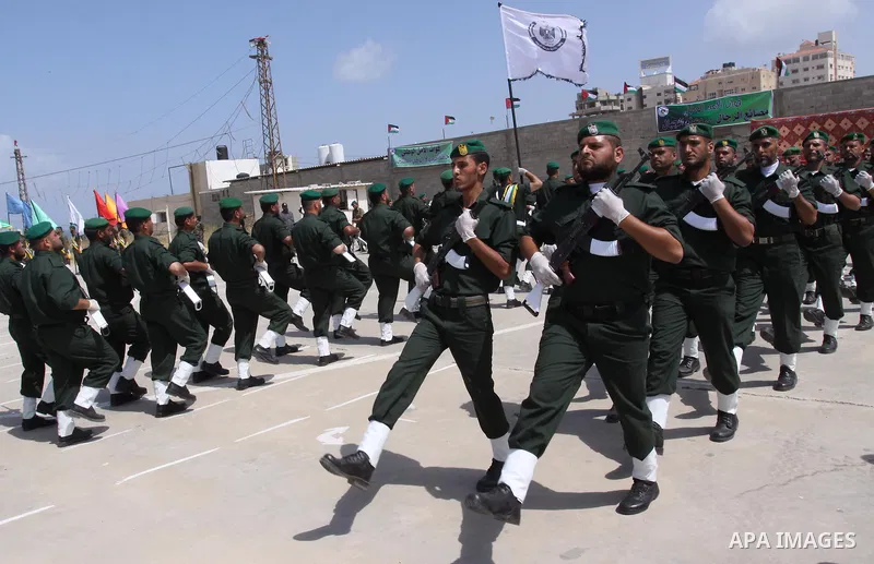 Palestinian Hamas National security force officers stand to attention during their graduation ceremony in Gaza City on April 19, 2012. Photo by Mohammed Asad