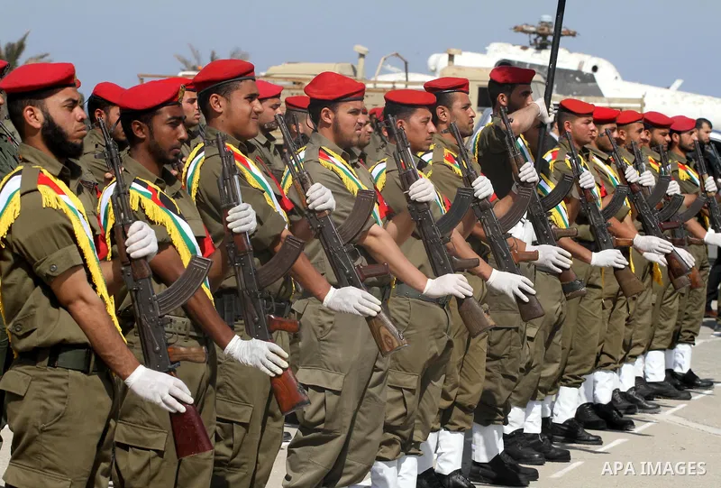 Palestinian Hamas National security force officers stand to attention during their graduation ceremony in Gaza City on April 19, 2012. Photo by Mohammed Asad