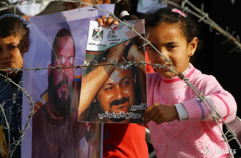 Palestinians participate in a demonstration calling for the release of Palestinian prisoners jailed in Israel, near Erez border crossing between Israel and the northern Gaza Strip, on April 19, 2012. Photo by Ashraf Amra