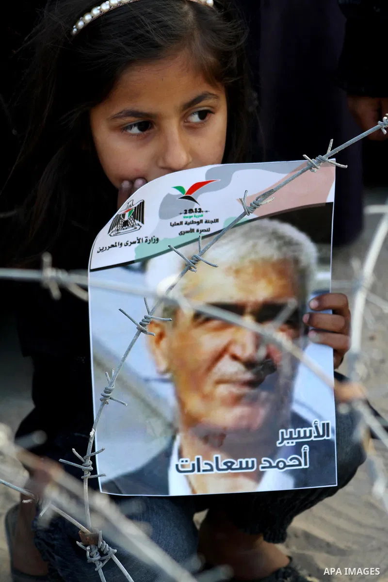Palestinians participate in a demonstration calling for the release of Palestinian prisoners jailed in Israel, near Erez border crossing between Israel and the northern Gaza Strip, on April 19, 2012. Photo by Ashraf Amra
