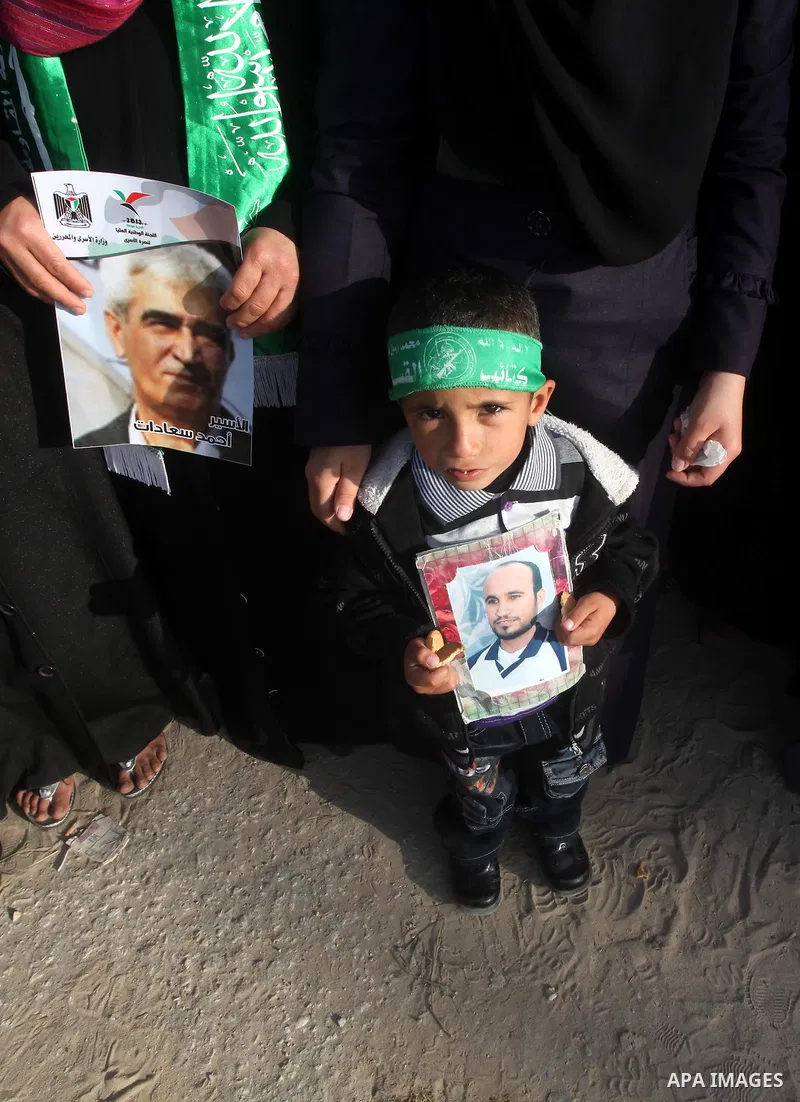 Palestinians participate in a demonstration calling for the release of Palestinian prisoners jailed in Israel, near Erez border crossing between Israel and the northern Gaza Strip, on April 19, 2012. Photo by Ashraf Amra