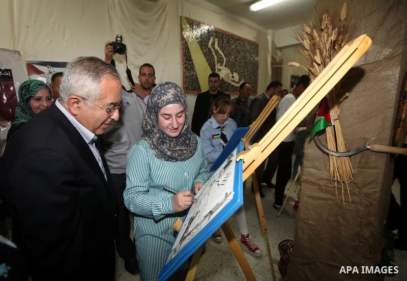 Palestinian prime minister Salam Fayyad during an inspecting visit in Tobas governorate and outskirts of the West Bank Jordan Valley. on April 19, 2012. Photo by Mustafa Abu Dayeh