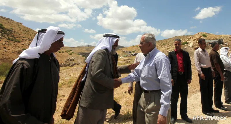 Palestinian prime minister Salam Fayyad during an inspecting visit in Tobas governorate and outskirts of the West Bank Jordan Valley. on April 19, 2012. Photo by Mustafa Abu Dayeh
