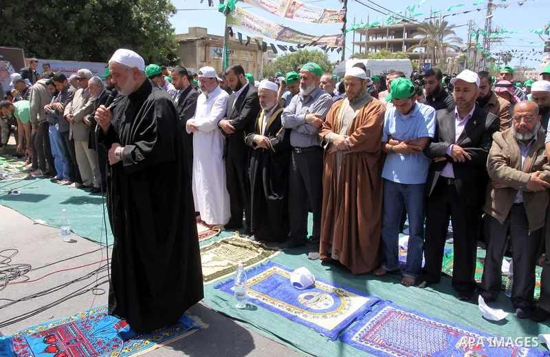Palestinian Prime Minister in Gaza Ismail Haniya attends a protest in solidarity with Palestinian prisoners being held in Israeli jails, following the Friday noon prayers, in Gaza City, on April 20, 2012. Photo by Mohamm...
