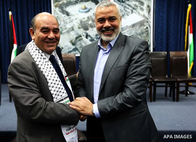 Palestinian Prime Minister in Gaza Strip, Ismail Haniya receives delegation of the the Arab organization for Human Rights in his office in Gaza city on April 21, 2012. Photo by Ahmed Shaat