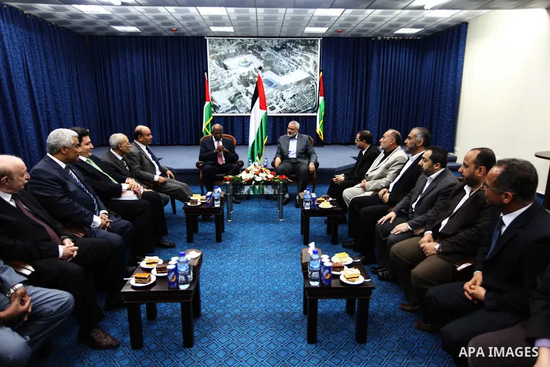 Palestinian Prime Minister in Gaza Strip, Ismail Haniya receives delegation of the the Arab organization for Human Rights in his office in Gaza city on April 21, 2012. Photo by Ahmed Shaat