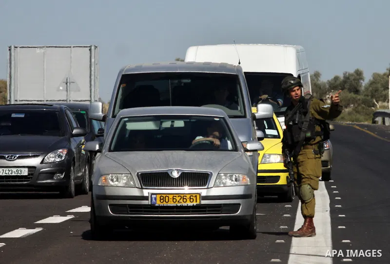 Israeli soldiers closed Tappuah checkpoint, after arrested two Palestinians young their has a pistol and explosion materials. southern Nablus city in the west bank,on April 21, 2012. Photo by Nedal Eshtaya