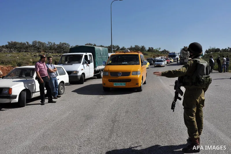 Israeli soldiers closed Tappuah checkpoint, after arrested two Palestinians young their has a pistol and explosion materials. southern Nablus city in the west bank,on April 21, 2012. Photo by Nedal Eshtaya