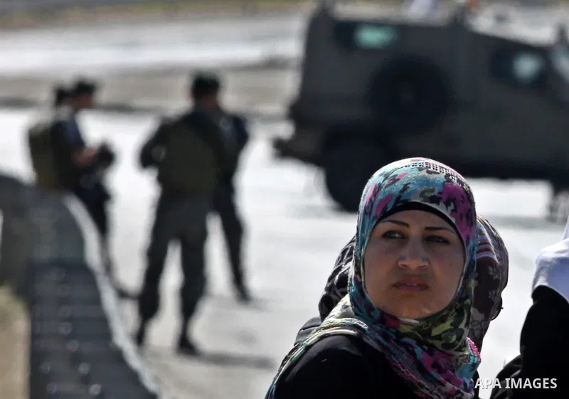 Israeli soldiers closed Tappuah checkpoint, after arrested two Palestinians young their has a pistol and explosion materials. southern Nablus city in the west bank,on April 21, 2012. Photo by Nedal Eshtaya