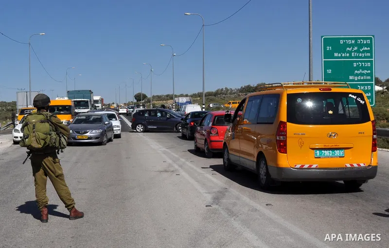 Israeli soldiers closed Tappuah checkpoint, after arrested two Palestinians young their has a pistol and explosion materials. southern Nablus city in the west bank,on April 21, 2012. Photo by Nedal Eshtaya