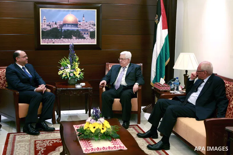 Palestinian President, Mahmoud Abbas (Abu Mazen), meets with Egyptian Ambassador, in the West Bank City of Ramallah on April 21, 2012. Photo by Thaer Ganaim