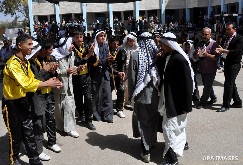 Palestinian school students dance during the Open Day Festival in the city of Nablus in the West Bank, on April,22 2012. Photo by Nedal Eshtaya