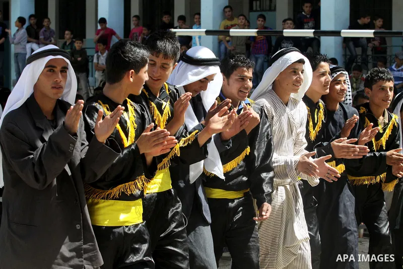 Palestinian school students dance during the Open Day Festival in the city of Nablus in the West Bank, on April,22 2012. Photo by Nedal Eshtaya