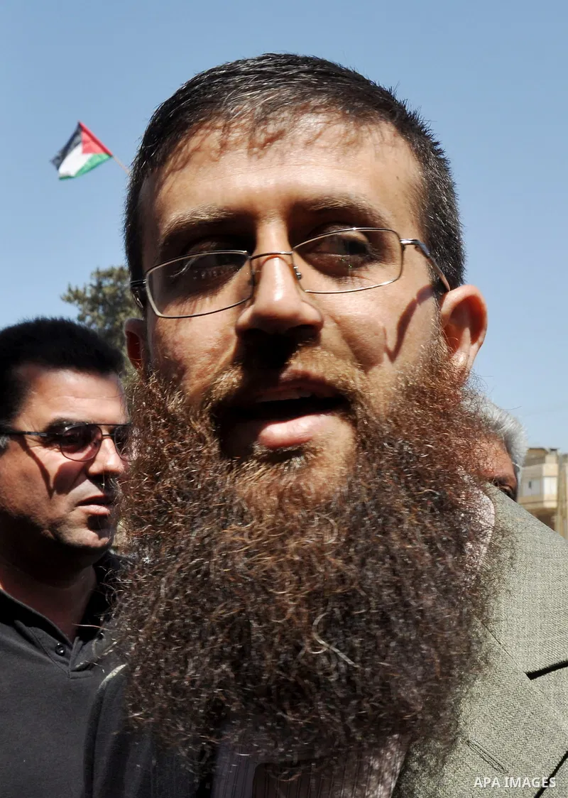 Palestinian Khader Adnan, a senior member of Islamic Jihad, who didn't eat for 66 days, was set to be freed later as part of a deal reached with Israel, attend a protest calling for the release of Palestinian prisoners h...