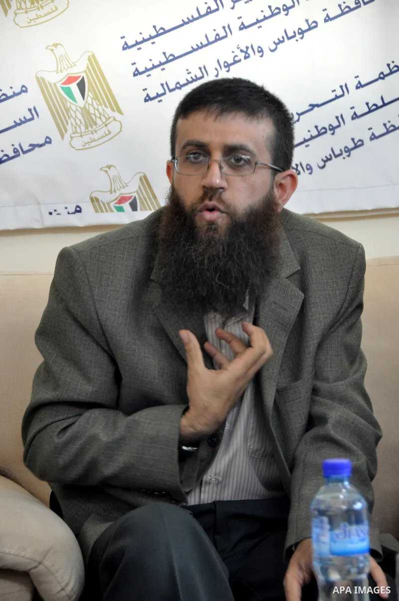 Palestinian Khader Adnan, a senior member of Islamic Jihad, who didn't eat for 66 days, was set to be freed later as part of a deal reached with Israel, during a ceremony honoring from province of Tubas, in the West Bank...