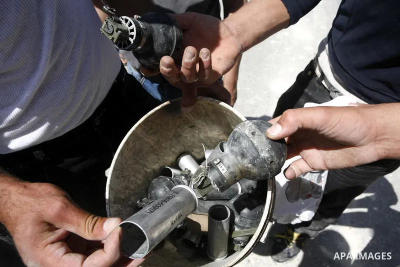 Israeli soldiers fire tear gas at Palestinian students during clashes near their school at Oref Village near the West Bank City of Nablus on 23 April 2012 .Israeli settlers from Jewish settlement of Yetshar attacked the...
