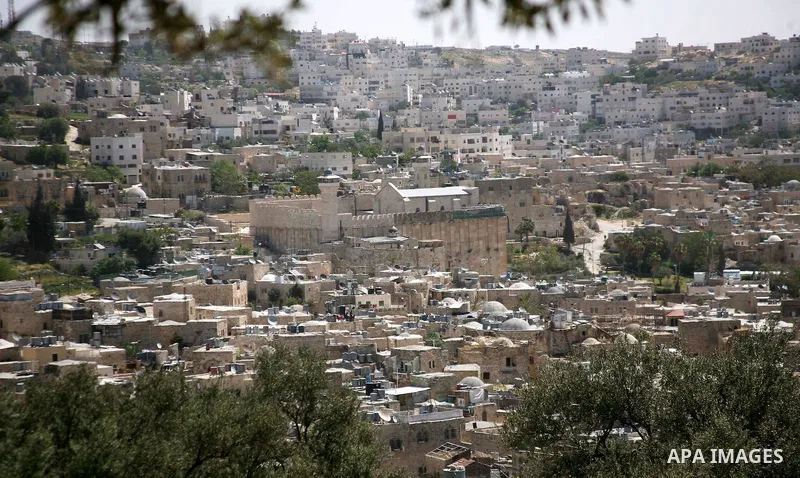 A general view from the garden of a Palestinian house in the southern West Bank city of Hebron from which an Israeli court ordered the Israeli settlers out by May 15 after ruling on April 23, 2012 that their claim to own...