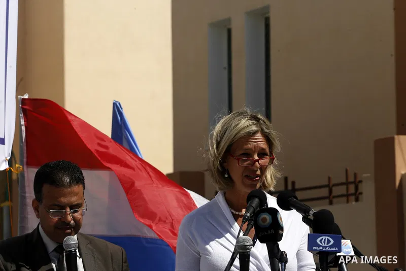 Birgitta Tazelaar (3rd R), head of the Netherlands Representation to the Palestinian Authority, speaks during a ceremony in Khan Younis, in the southern Gaza Strip, on April 24, 2012. Palestinians whose houses were destr...