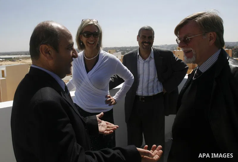 Birgitta Tazelaar head of the Netherlands Representation to the Palestinian Authority, alongside UNRWA's Filippo Grandi, during a ceremony in Khan Younis, in the southern Gaza Strip, on April 24, 2012. Palestinians whose...