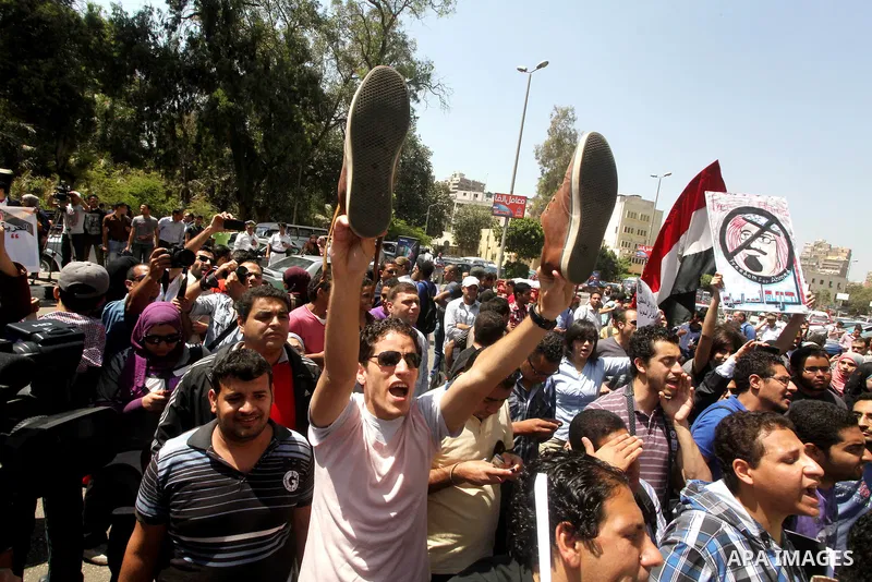 Egyptian protesters take part in a demonstration in front of the Saudi Arabian embassy in Cairo on April 24, 2012, calling for the release of Egyptians who have been detained in the kingdom, including Ahmed Al-Gizawi who...