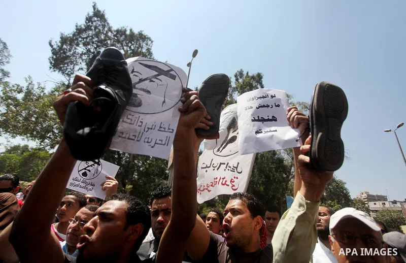 Egyptian protesters take part in a demonstration in front of the Saudi Arabian embassy in Cairo on April 24, 2012, calling for the release of Egyptians who have been detained in the kingdom, including Ahmed Al-Gizawi who...