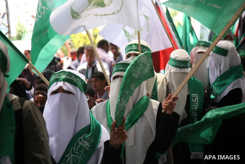 Palestinian students supporters of the Islamic group Hamas, seen during Palestine Polytechnic University. Students Council elections campaign at the Palestine Polytechnic University in the West Bank city of Hebron on Apr...