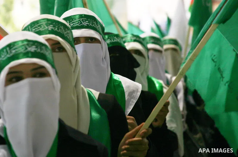 Palestinian students supporters of the Islamic group Hamas, seen during Palestine Polytechnic University. Students Council elections campaign at the Palestine Polytechnic University in the West Bank city of Hebron on Apr...