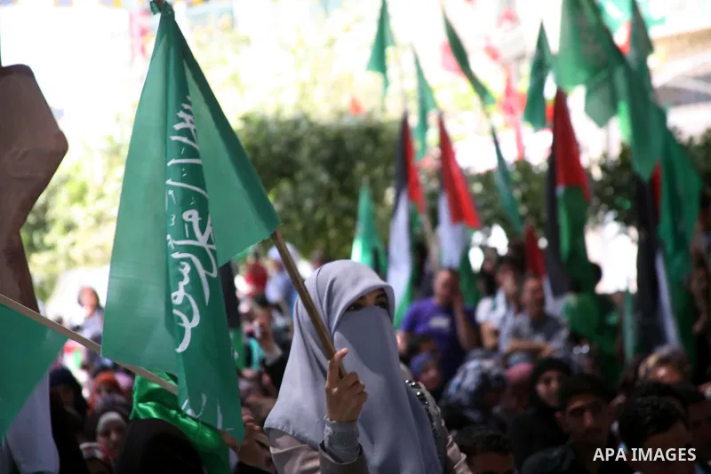 Palestinian students supporters of the Islamic group Hamas, seen during Palestine Polytechnic University. Students Council elections campaign at the Palestine Polytechnic University in the West Bank city of Hebron on Apr...