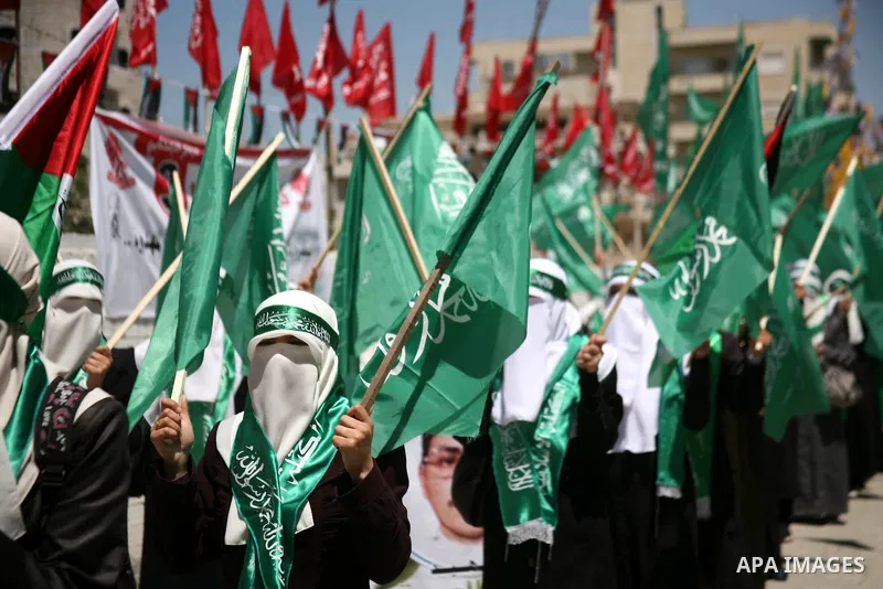 Palestinian students supporters of the Islamic group Hamas, seen during Palestine Polytechnic University. Students Council elections campaign at the Palestine Polytechnic University in the West Bank city of Hebron on Apr...