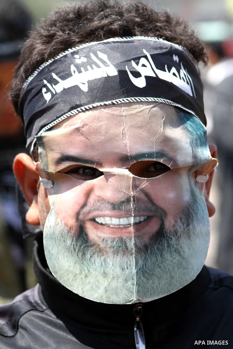 Egyptian masked man chants slogans during a protest at Tahrir Square in Cairo, Egypt on April 25, 2012. Several thousand Egyptians are protesting against the country's military rulers. Photo by Ashraf Amra