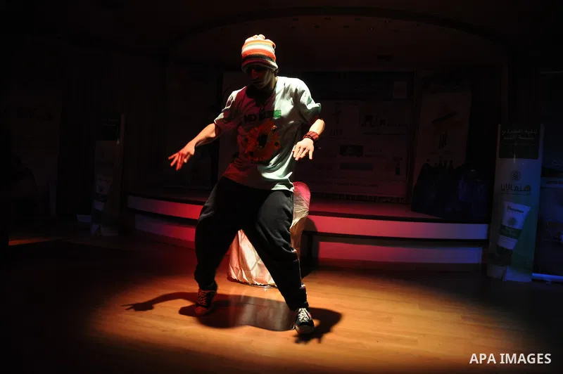 Palestinians performs dance during festival for children in the West Bank city of Nablus, on April 25, 2012. Photo by Nedal Eshtayah