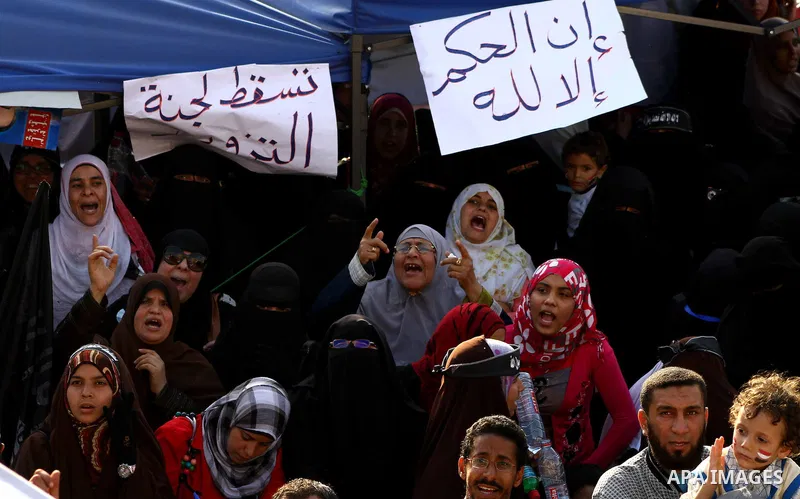 Supporters of Salafist leader and former presidential candidate Hazem Salah Abu Ismail, chant slogans against the country's military rulers during a sit-in at Tahrir Square in Cairo, April 26, 2012. Egypt's election comm...