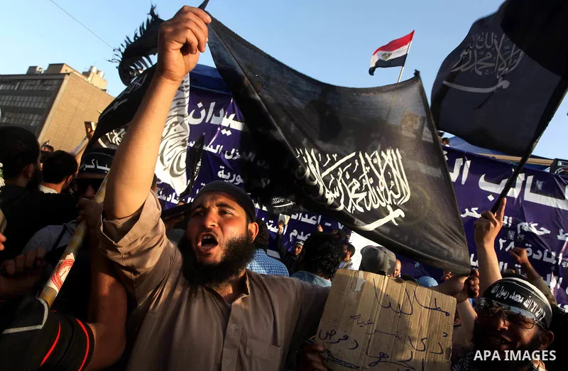 Supporters of Salafist leader and former presidential candidate Hazem Salah Abu Ismail, chant slogans against the country's military rulers during a sit-in at Tahrir Square in Cairo, April 26, 2012. Egypt's election comm...