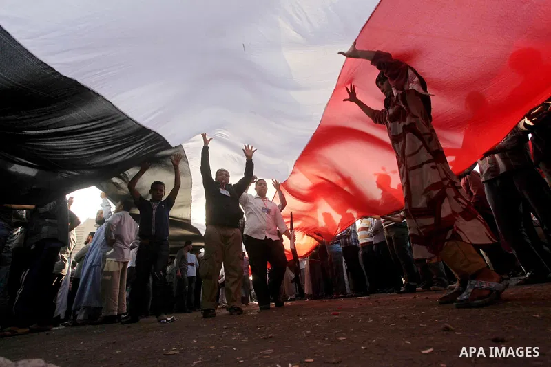 Supporters of Salafist leader and former presidential candidate Hazem Salah Abu Ismail, chant slogans against the country's military rulers during a sit-in at Tahrir Square in Cairo, April 26, 2012. Egypt's election comm...