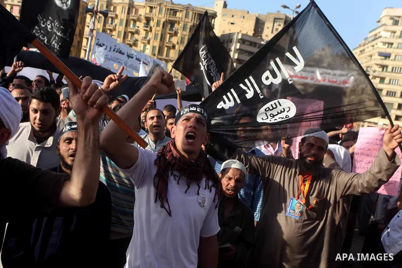Supporters of Salafist leader and former presidential candidate Hazem Salah Abu Ismail, chant slogans against the country's military rulers during a sit-in at Tahrir Square in Cairo, April 26, 2012. Egypt's election comm...