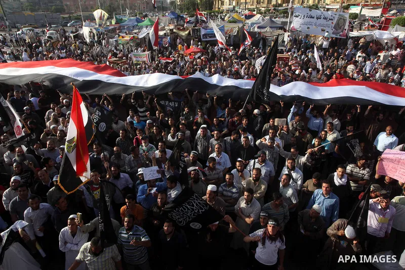 Supporters of Salafist leader and former presidential candidate Hazem Salah Abu Ismail, chant slogans against the country's military rulers during a sit-in at Tahrir Square in Cairo, April 26, 2012. Egypt's election comm...