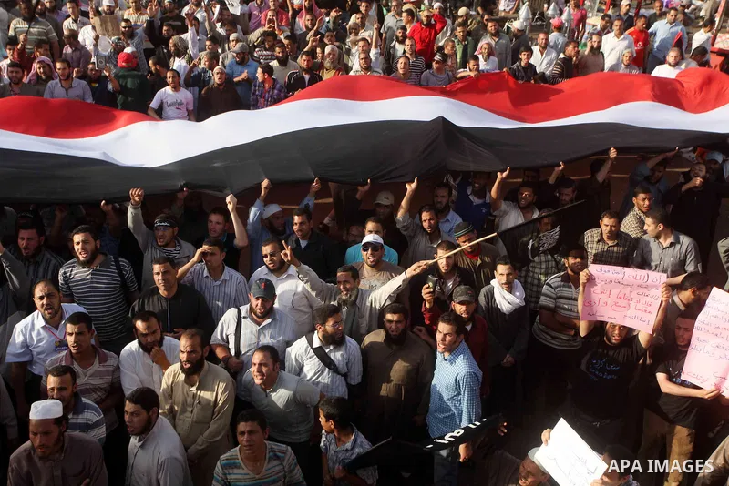 Supporters of Salafist leader and former presidential candidate Hazem Salah Abu Ismail, chant slogans against the country's military rulers during a sit-in at Tahrir Square in Cairo, April 26, 2012. Egypt's election comm...
