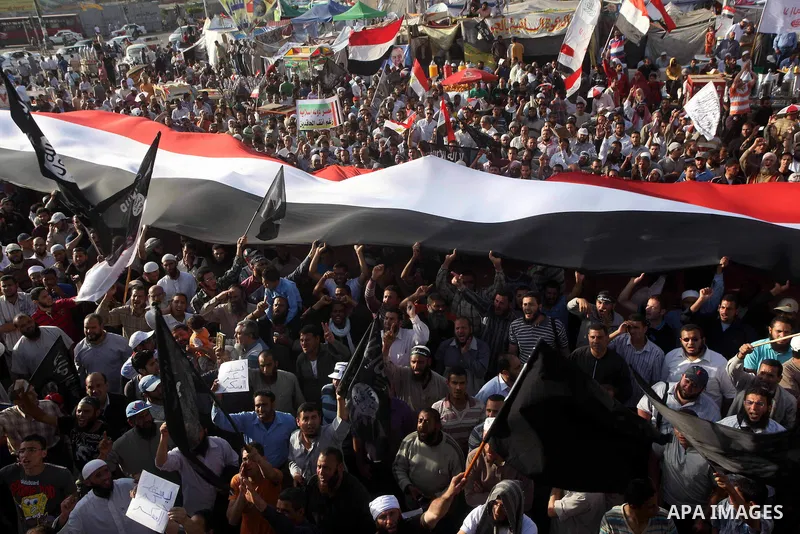 Supporters of Salafist leader and former presidential candidate Hazem Salah Abu Ismail, chant slogans against the country's military rulers during a sit-in at Tahrir Square in Cairo, April 26, 2012. Egypt's election comm...