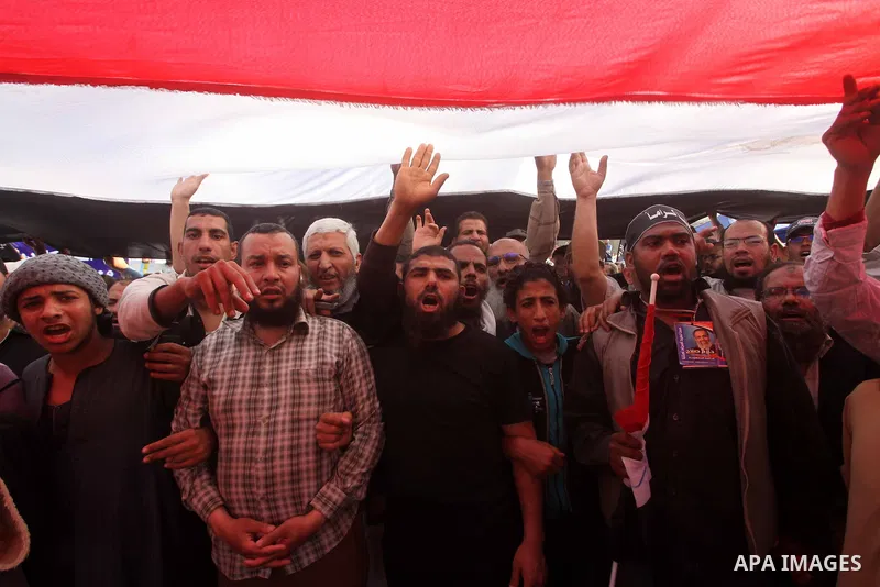 Supporters of Salafist leader and former presidential candidate Hazem Salah Abu Ismail, chant slogans against the country's military rulers during a sit-in at Tahrir Square in Cairo, April 26, 2012. Egypt's election comm...