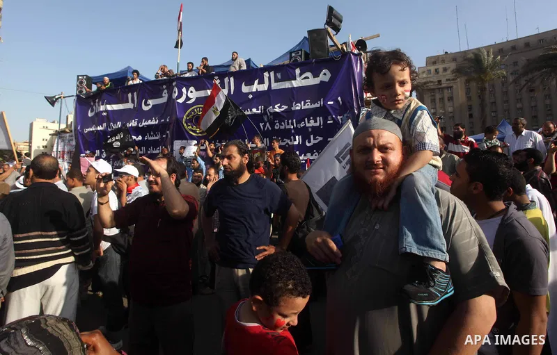 Supporters of Salafist leader and former presidential candidate Hazem Salah Abu Ismail, chant slogans against the country's military rulers during a sit-in at Tahrir Square in Cairo, April 26, 2012. Egypt's election comm...