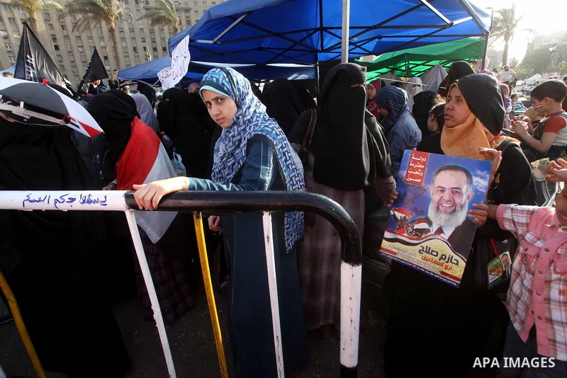 Supporters of Salafist leader and former presidential candidate Hazem Salah Abu Ismail, chant slogans against the country's military rulers during a sit-in at Tahrir Square in Cairo, April 26, 2012. Egypt's election comm...