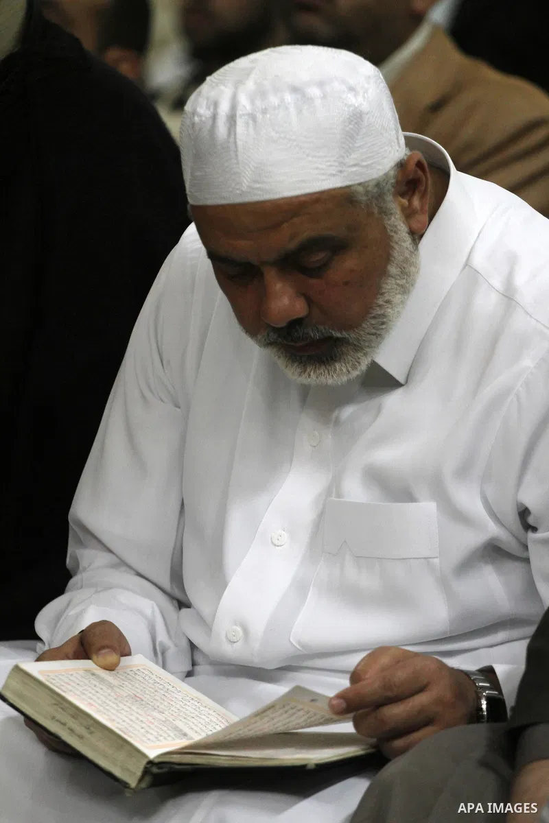 Palestinian Prime Minister in Gaza Ismail Hania, attend by Legislative Council members, Ministers and Clerics in Gaza, during a prayer for the prisoners in Israeli jails. in Gaza city on April 26, 2012.. Photo by Mohamme...