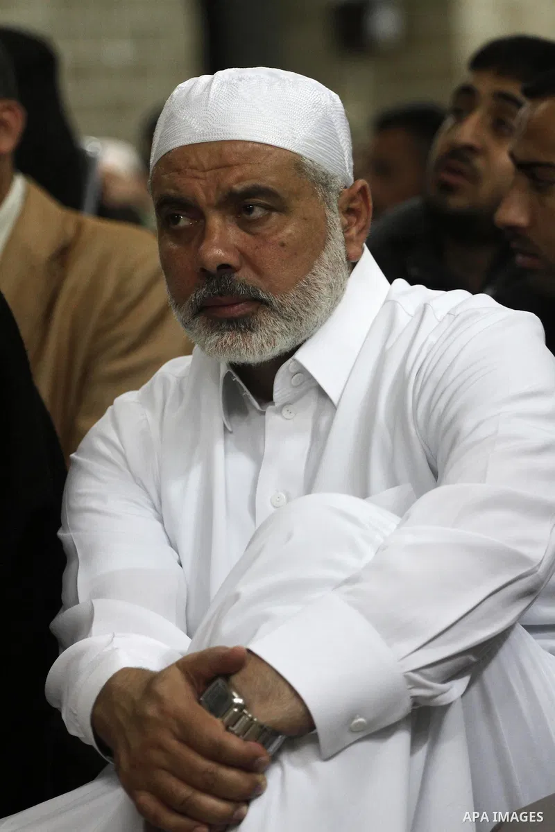 Palestinian Prime Minister in Gaza Ismail Hania, attend by Legislative Council members, Ministers and Clerics in Gaza, during a prayer for the prisoners in Israeli jails. in Gaza city on April 26, 2012.. Photo by Mohamme...
