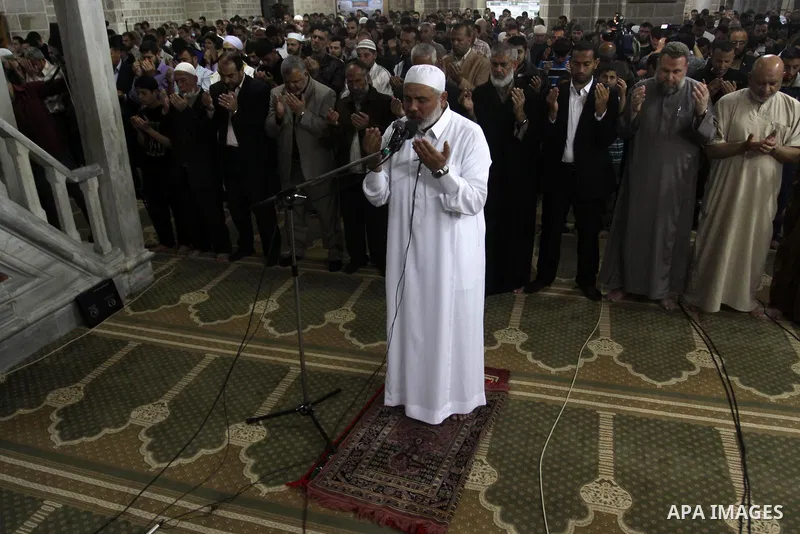 Palestinian Prime Minister in Gaza Ismail Hania, attend by Legislative Council members, Ministers and Clerics in Gaza, during a prayer for the prisoners in Israeli jails. in Gaza city on April 26, 2012.. Photo by Mohamme...