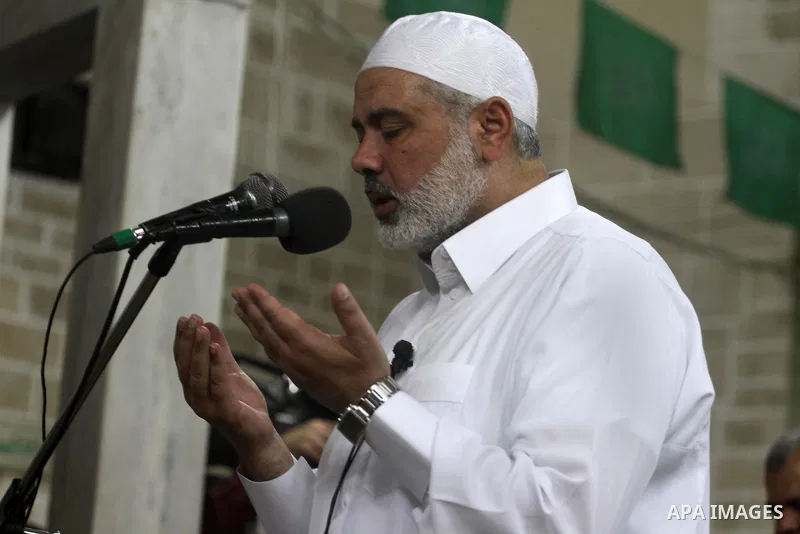 Palestinian Prime Minister in Gaza Ismail Hania, attend by Legislative Council members, Ministers and Clerics in Gaza, during a prayer for the prisoners in Israeli jails. in Gaza city on April 26, 2012.. Photo by Mohamme...
