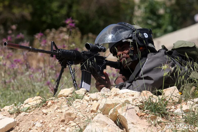 Israeli forces clash with Palestinian stone throwers during a weekly demonstration against the expansion of the nearby Jewish settlement of Halamish in the West Bank village of Nabi Saleh near Ramallah, Friday, April 27,...